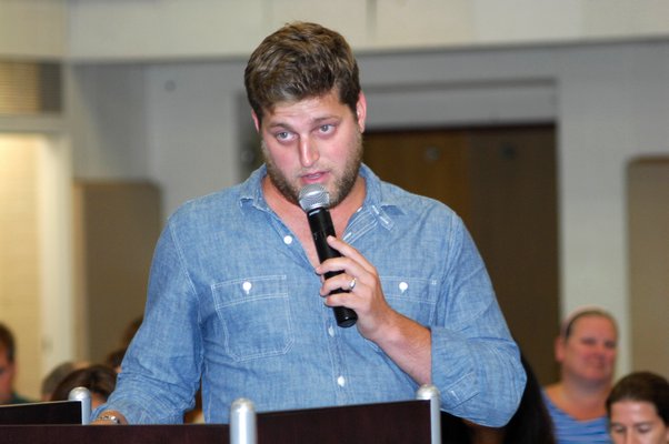 Zach Epley speaks at the meeting on Thursday.  DANA SHAW