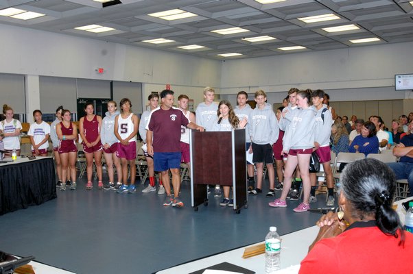 members of the Southampton High School Cross Country team voiced their support for the merger.  DANA SHAW