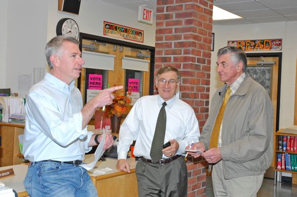 Tuckahoe School Board of Education Vice-President  Daniel Crough, Superintendent Chris Dyer and school board president Bob Griskick at Tuckahoe School on Tuesday night.  DANA SHAW