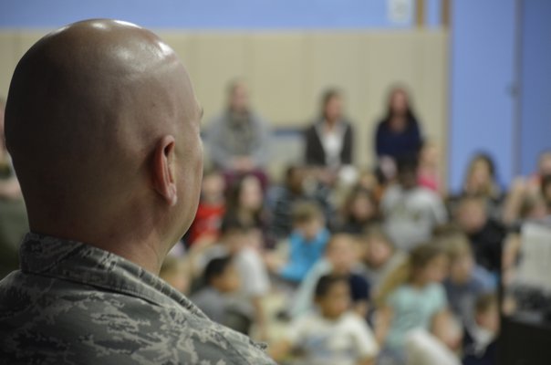 Lt. Col Robert Siebelts talks to students at the Remsenburg-Speonk Elementary School about life as part of the ANG's 106th Rescue Wing. BY ERIN MCKINLEY