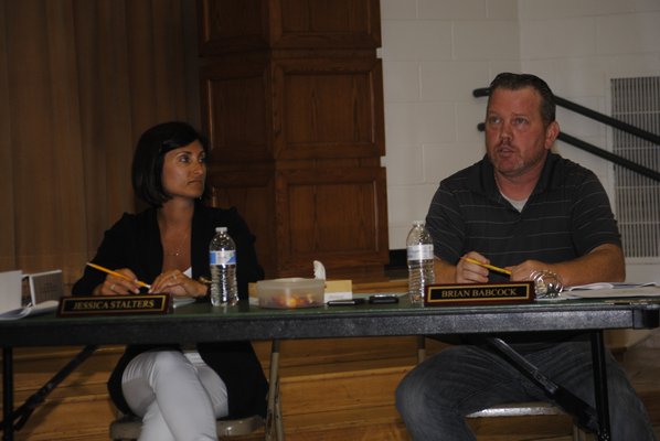 East Quogue Board of Education Vice President Jessica Stalters and Trustee Brian Babcock during Tuesday's meeting. AMANDA BERNOCCO