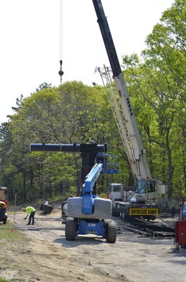 Work on the east bound billboard continues on Tuesday.