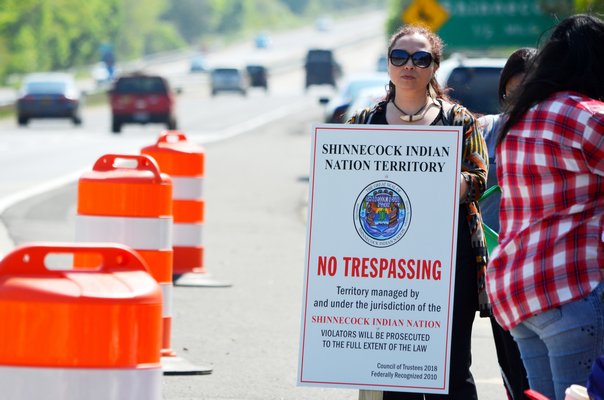 "No Trespassing" signs were posted by the Shinnecock Indian Nation at the sites of both billboards being constructed along Sunrise Highway. ANISAH ABDULLAH