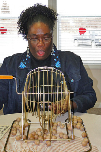 Karen Torrence, director of the Shinnecock Senior Center Nutrition Program, calls the numbers in bingo.