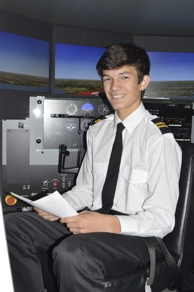 Southampton High School Senior Michael Minogue inside a flight simulator at the Eastern Suffolk BOCES campus in Brookhaven, where is in enrolled in a pilot training program through Academy LI at Bixhorn Technical Center. ALYSSA MELILLO