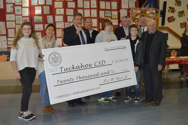 The Tuckahoe School received a $20,000 grant from State Assemblyman Fred W. Thiele Jr. on Friday that will be used to create new programs for seventh- and eigth-graders to help them with their transition to high school. ALYSSA MELILLO
