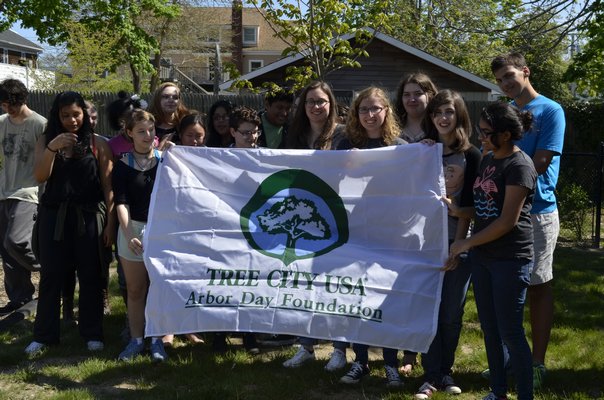 Members of the Westhamtpon Beach CURE club at the village Arbor Day tree planting on Friday. BY ERIN MCKINLEY