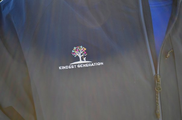 Brian Tupper has a jacket with an embroidered Kindest Generation logo. It was a Christmas gift from his brother, Jeff Tupper. ANISAH ABDULLAH