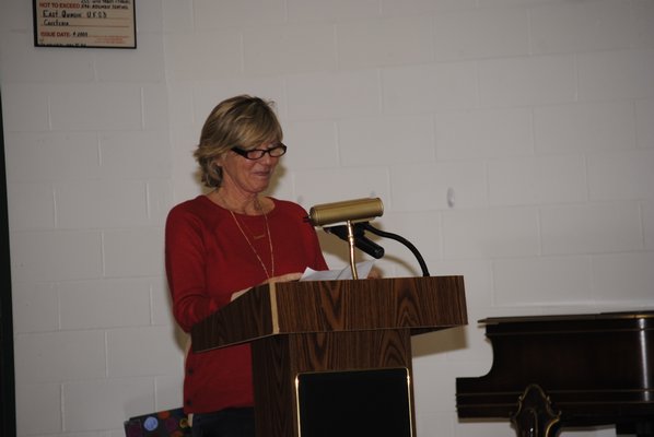 Susan Kearns, a Westhampton Beach teacher, speaks in support of the teachers at East Quogue Elementary.  AMANDA BERNOCCO