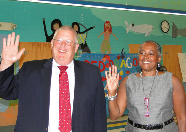 Southampton School Board members Don King and Roberta Hunter take the oath of office in the Southampton Elementary School cafeteria on July 7.
