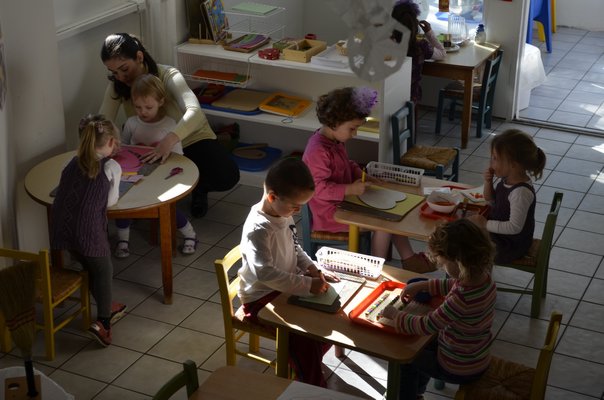 Students in the Southampton Montessori School prekindergarten class hard at work on Friday. BY ERIN MCKINLEY