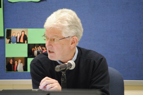 Kenneth Cooke, Eastport South Manor Board of Education president, at Wednesday night's meeting. AMANDA BERNOCCO