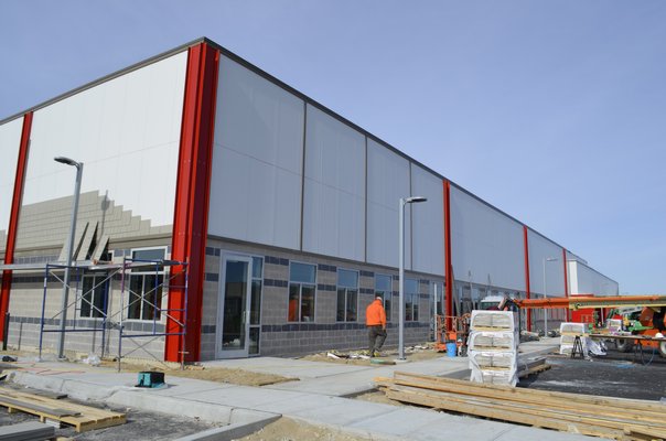 Construction underway at the Hampton Business District's newest building at 215 Rogers Way. ANISAH ABDULLAH