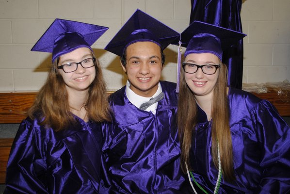 From left: Hannah Goetz, Josh Albarino and Julia Tetrault  graduated on Saturday afternoon. AMANDA BERNOCCO