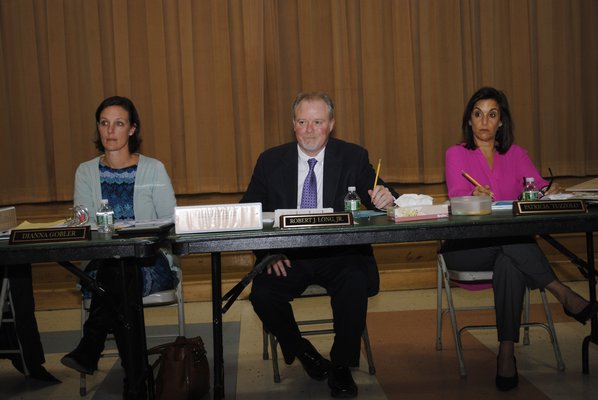 The East Quogue Board of Education during Tuesday night's meeting. AMANDA BERNOCCO