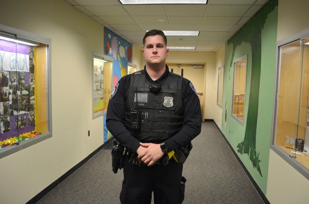 Westhampton Beach Village Police Officer Andrew Kirwin is the school district's first and only school resource officer. ANISAH ABDULLAH