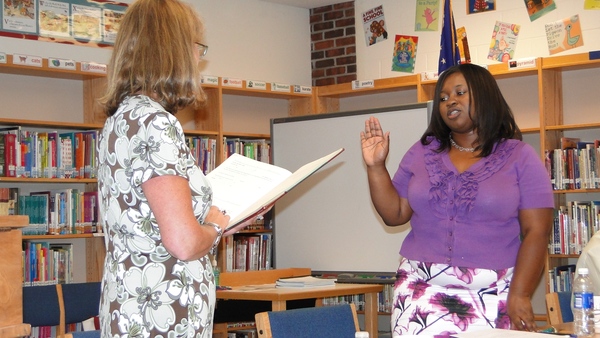 Tuckahoe School District Clerk Linda Springer swears in new district treasurer Nicola Graham on Monday, July 11.