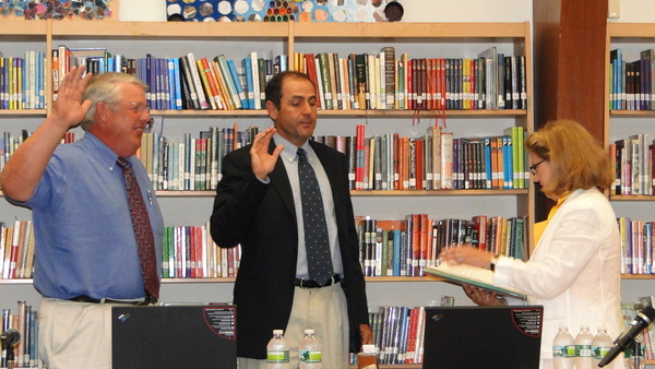 Southampton School District Clerk Mary Pontieri swears in School Board Vice President Don King and President David Dubin on Tuesday, July 12, to another year each in their respective roles.