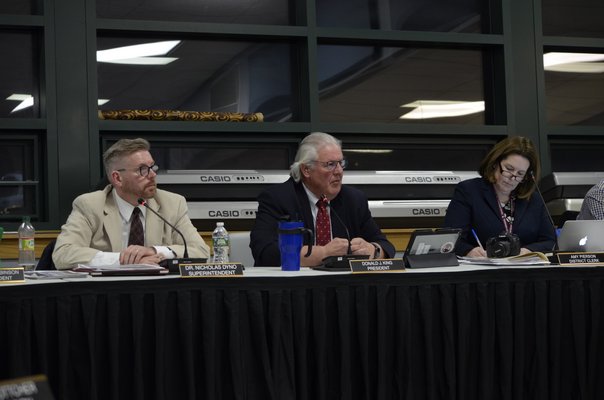 Superintendent of Schools Nicholas Dyno, Board of Education President Donald King and District Clerk Amy Pierson at Tuesday's board meeting. ANISAH ABDULLAH
