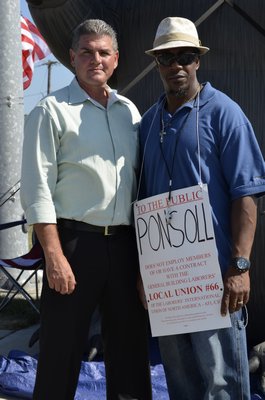 Don Grande, left, bricklayer business agent for Long Island local workers and Daryl Harris, organizer for the Local 66 union. ALEXA GORMAN