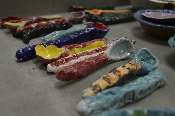 Tuckahoe School students have spent months making ceramic and clay bowls and spoons for the school's second Empty Bowls event, which helps raise awareness of hunger. ALYSSA MELILLO