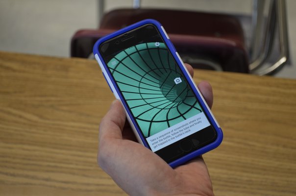 Westhampton Beach High School mach teacher Nick Kochis introduced an augmented reality app into his classrooms this year. ANISAH ABDULLAH