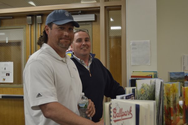 Quogue Board of Education candidates Steve Failla and John Mensch at Tuesday night's election. Mr. Failla was one of four people elected to the board with 83 votes. ALYSSA MELILLO