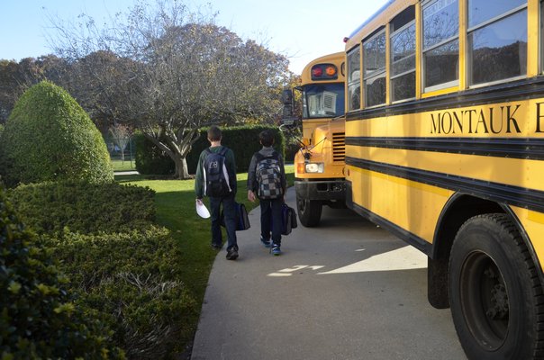 Tuckahoe students leave the building after classes on Monday. BY ERIN MCKINLEY