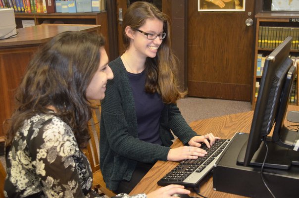 Co-editors of the Southampton High School newspaper, Riptide, Emma Tomicic and Lara Fayyaz are bringing the publication online. BY ERIN MCKINLEY