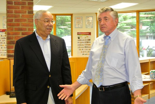 General Colin Powell with Robert Grisnik at the Tuckahoe School on Tuesday morning. DANA SHAW