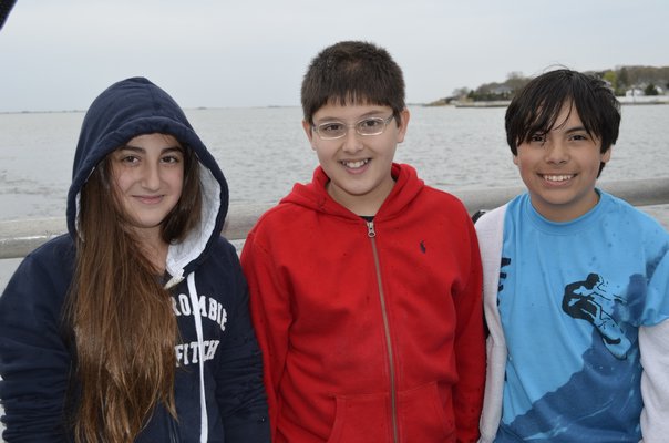 From left, East Quogue Elementary School sixth-graders Alexa Lotito, Onur Ozturk and Angel Herrera. ALEXA GORMAN