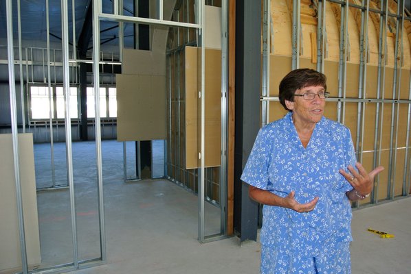 Sister Kathryn Schlueter in the unfinished portion of the Our Lady of the Hamptons School addition.. DANA SHAW