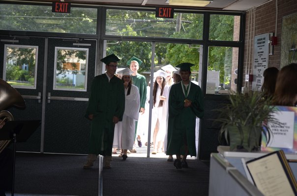 Graduating Westhampton Beach High School seniors did one last loop around their former elementary school on Wednesday. BY ERIN MCKINLEY