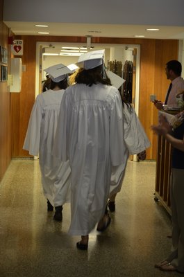 Graduating Westhampton Beach High School seniors did one last loop around their former elementary school on Wednesday. BY ERIN MCKINLEY