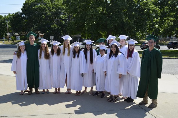 Graduating Westhampton Beach High School seniors did one last loop around their former elementary school on Wednesday. BY ERIN MCKINLEY