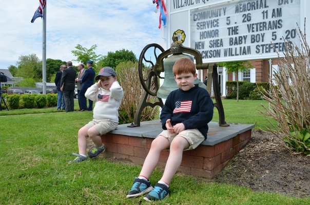 From left, Henry and Miles Tamis of Quogue at the Memorial Day service. Alexa Gorman