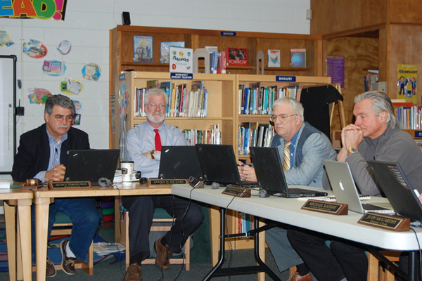 Westhampton Beach School Board President Aram Terchunian with Vice President Jim Hulme and board members Dr. Gregory Frost and Beecher Halsey at Monday's meeting.
