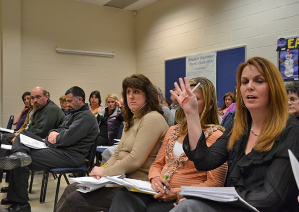 Members of the audience address the Eastport South Manor Board of Education at its March 2 meeting.
