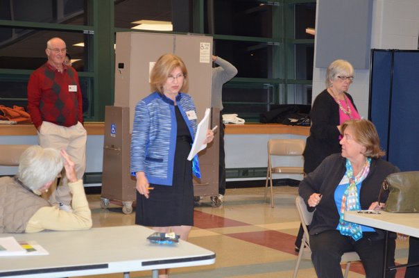 Scenes from the polls on Monday night. BY ERIN MCKINLEY