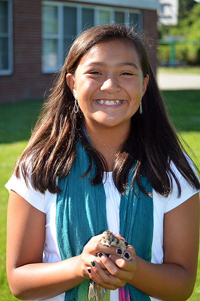 Sixth grader Grace O'Hare with a quail. ERIN MCKINLEY