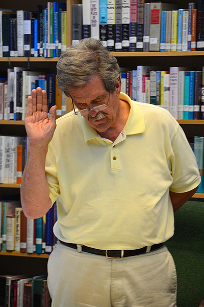 Gordon Werner is sworn into office at the Board of Education Reorganization meeting on Monday night. ERIN MCKINLEY