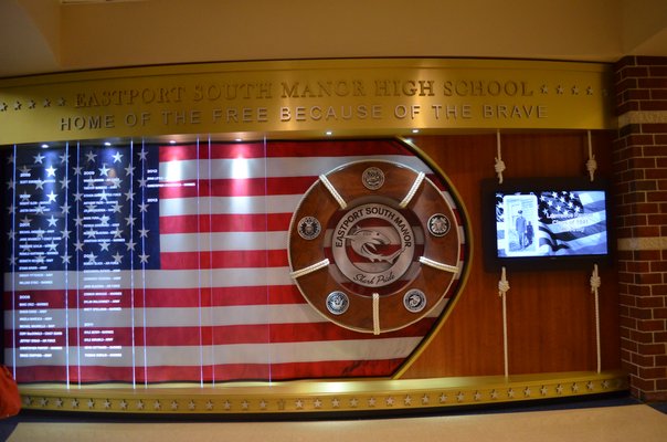 The Wall of Honor at Eastport South Manor Junior-Senior High School was completed in February of 2013. The names of ESM graduates in the armed forces were added for the dedication ceremony last week. Alexa Gorman