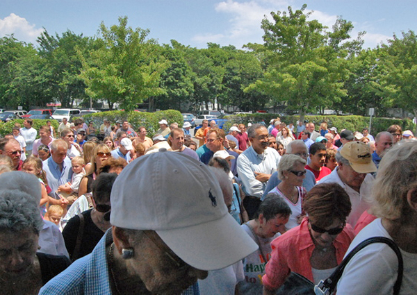 The crowd of people file into the Westhampton Free Library after its ribbon-cutting on Saturday.