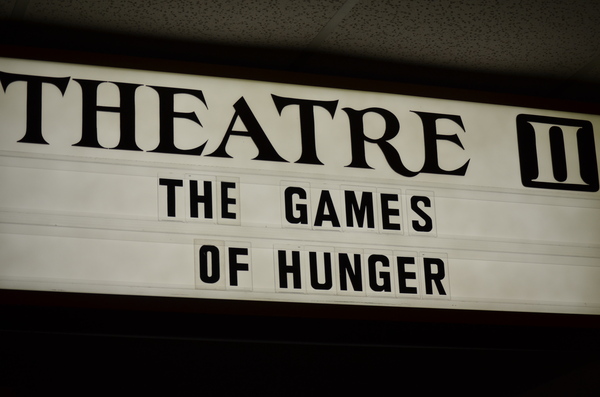 The marquee inside of the Hampton Arts Twin Movie Theater showing “The Games of Hunger.