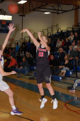 Pierson senior Isabel Peters puts up a three. ALEX FERRAIUOLO