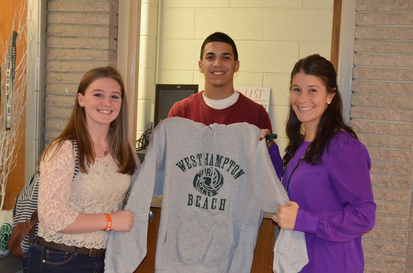 Junior Emma Gristina, senior Joe DiBenedetto and teacher Nicole Taylor at the new Hurricane Hut at Westhampton Beach High School. ERIN MCKINLEY