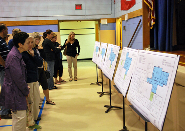 Residents check out designs before a Remsenburg/Speonk School Board meeting on Monday evening.