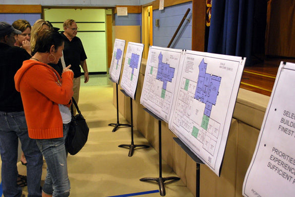 Residents look over designs for a proposed expansion of Remsenburg/Speonk Elementary School on Monday, September 27.