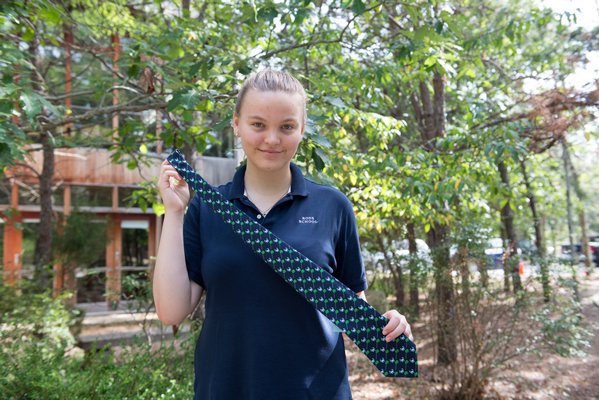 Dillon Kab, a senior at the Ross School in East Hampton, has started a company that creates fundraising programs for non-profit organizations. Her first program, Ties for a Cure, raises money for the Max Cure Foundation. Photo courtesy the Ross School.