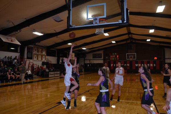 Pierson's Sofia Mancino drives to the basket and puts up a shot from the baseline. DREW BUDD